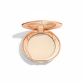 Charlotte Tilbury Powder Compact Flat Lay with Left Shadow